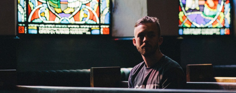 Man praying in a church