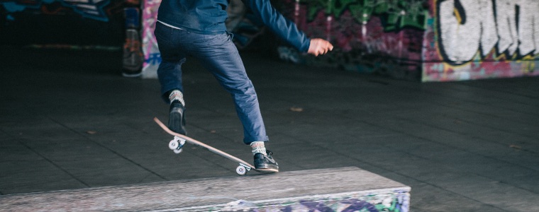 Skate boarder balancing
