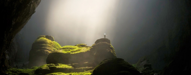 a person stood in the light praying